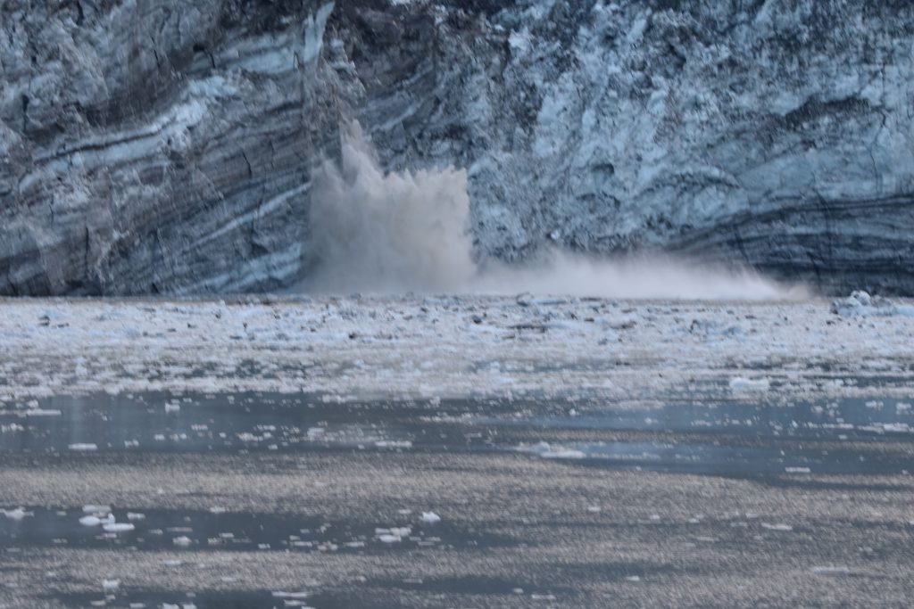 Johns Hopkins Glacier breaking off and splashing into the sea