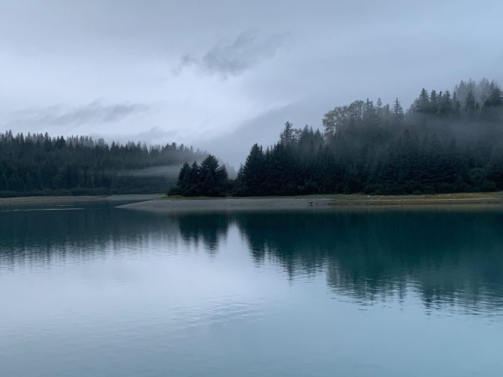 Foggy view of North Sandy Cove, Alaska in early morning.