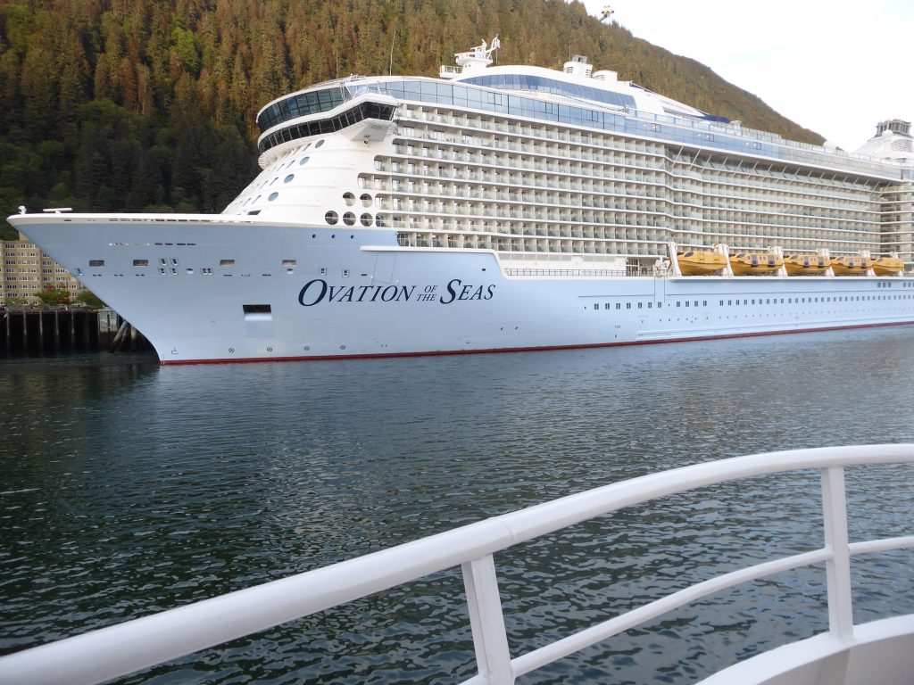 Ovation of the Seas cruise ship viewed from our Wilderness Discoverer ship. Many decks are visible (compared to our 3).