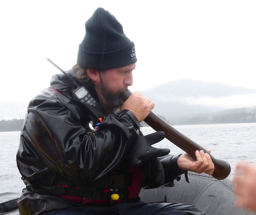 Doug playing a tune on a bit of bull kelp